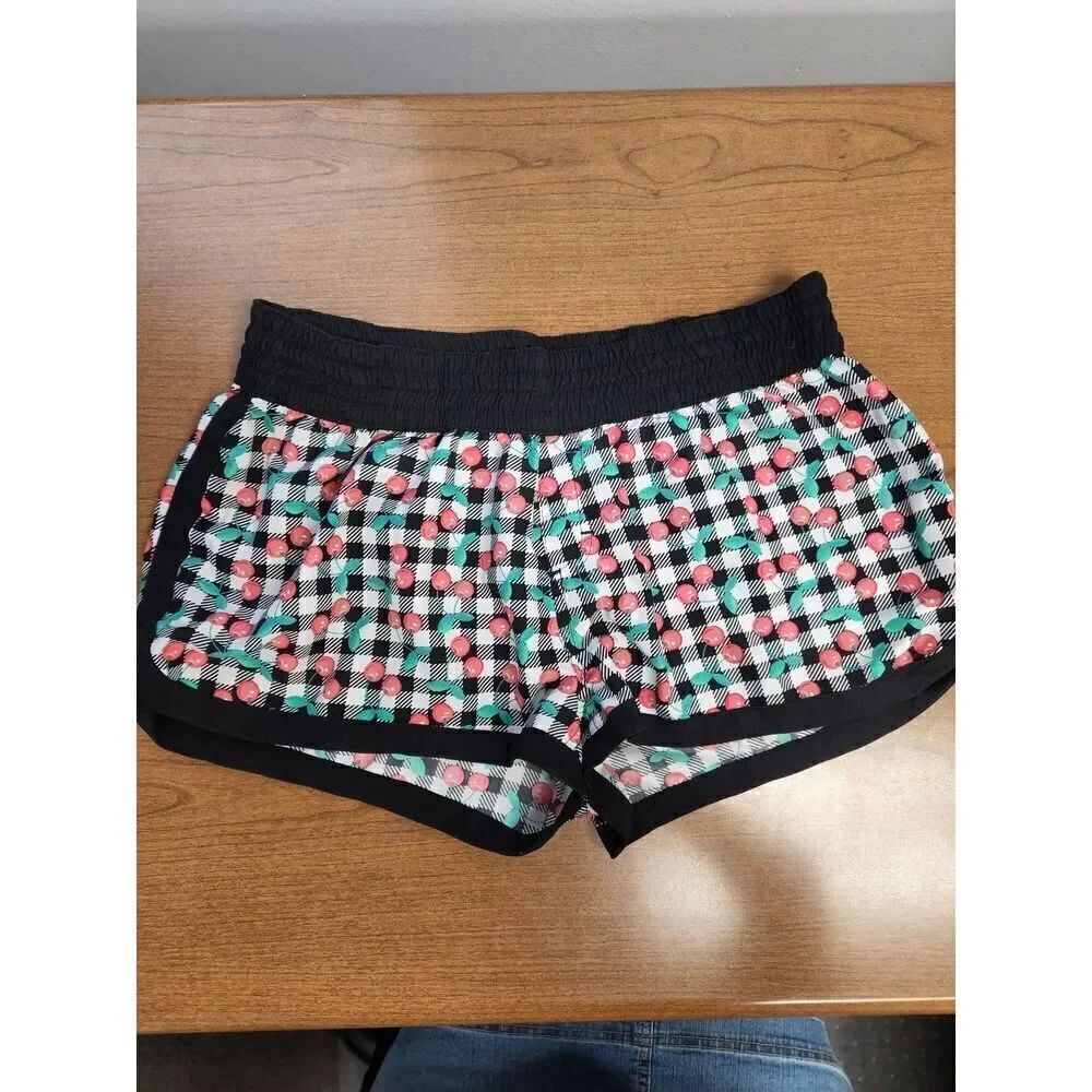 Arizona large cherry pattern shorts. Elastic waistband and faux fly.